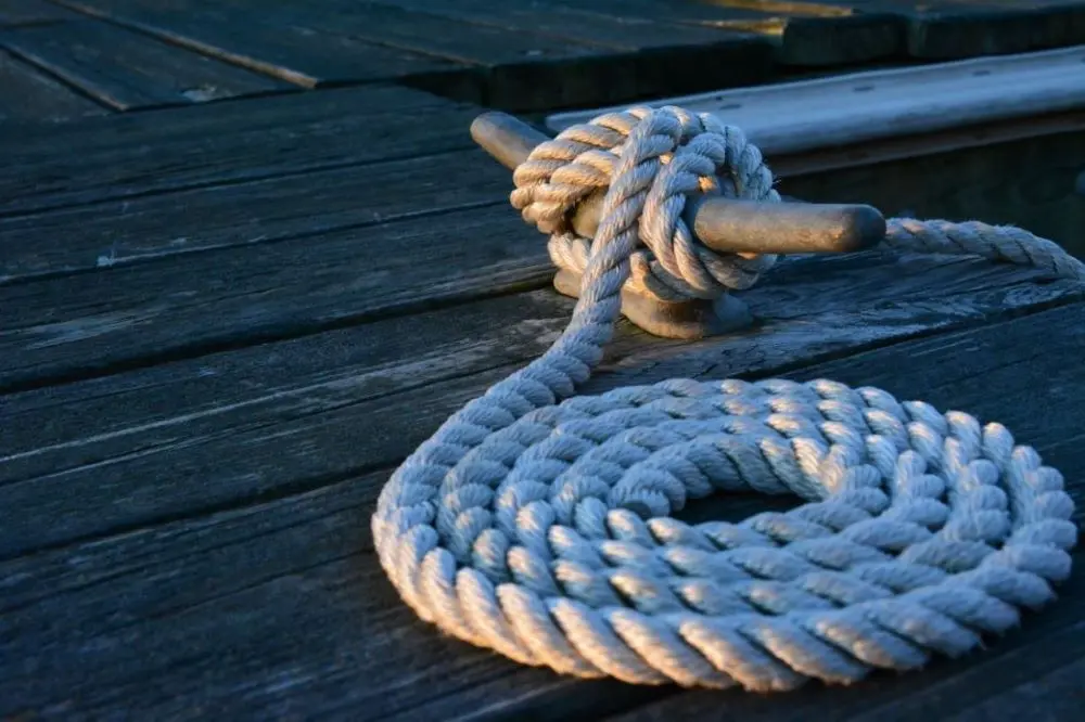 DockSwag™ dockside mooring rope coiled around cleat, showcasing nautical craftsmanship in Harbour Line styling